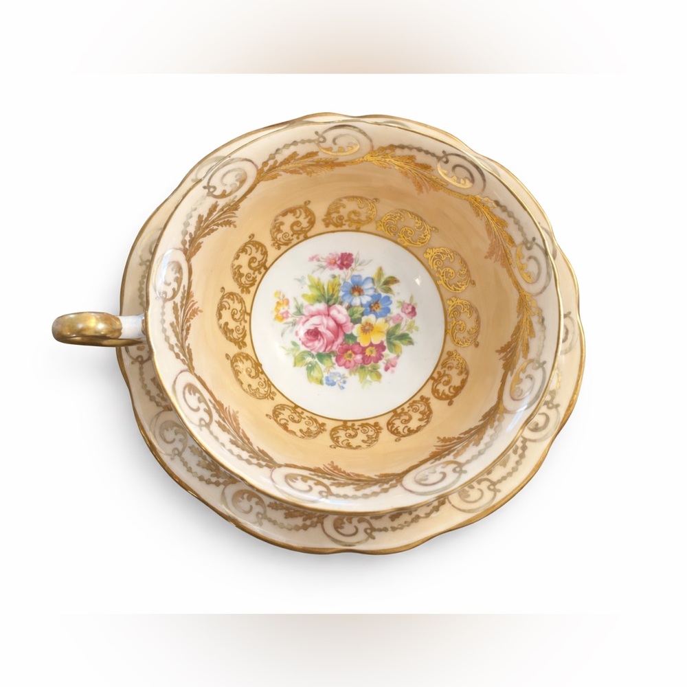 Charming Gold and White Teacup with Saucer